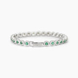 Bracciale tennis in argento 925/°°° rodiato con smeraldi sintetici Ø 3 mm e zirconi bianchi Ø 1.25 mm, lunghezza 17 cm