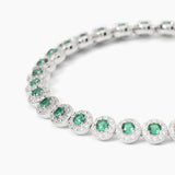 Bracciale tennis in argento 925/°°° rodiato con smeraldi sintetici Ø 3 mm e zirconi bianchi Ø 1.25 mm, lunghezza 17 cm