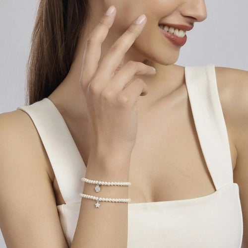 Bracciale con perle conchiglia e quadrifoglio zirconato
È SOLO FORTUNA 533738